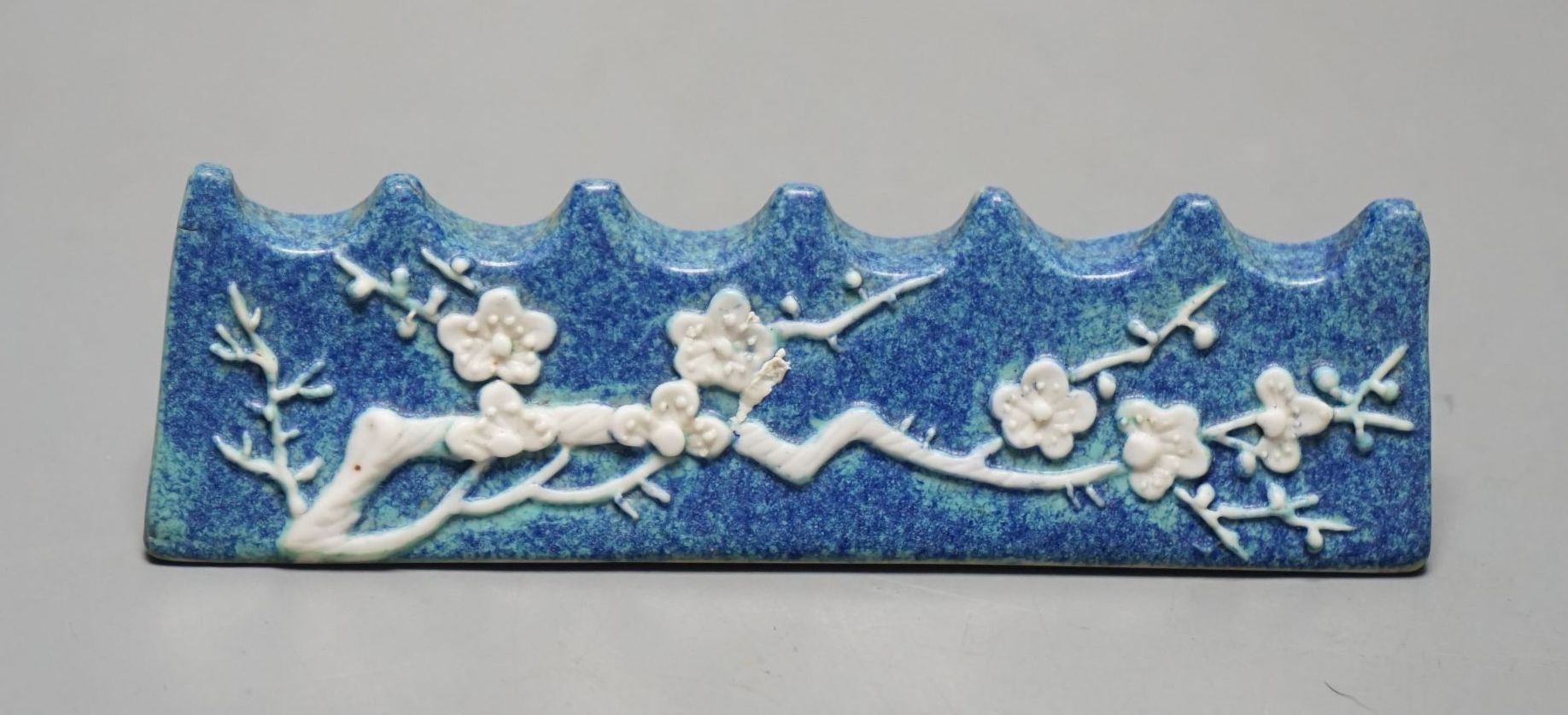 A Chinese robin's egg glazed brush rest, 19th century, 10 cms wide.